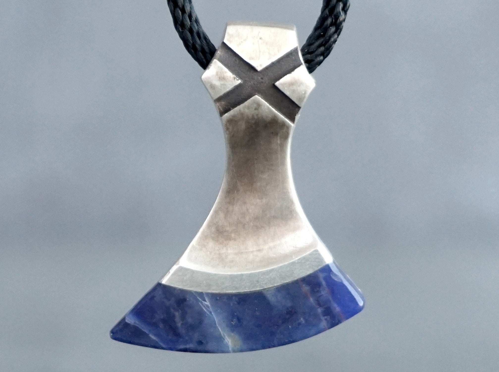 silver and blue sodalite stone axe amulet