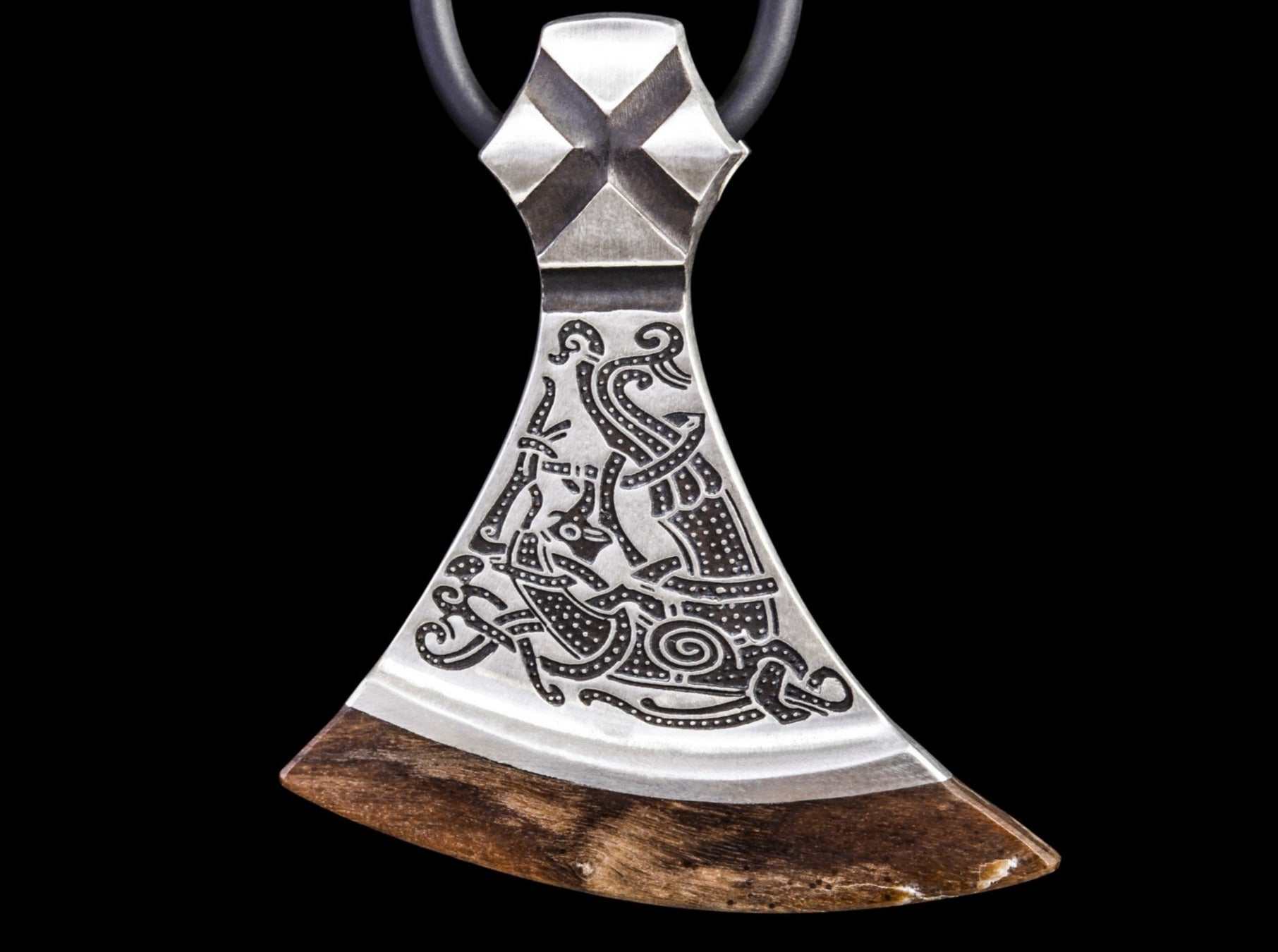 silver Mammen axe with a bird ornament