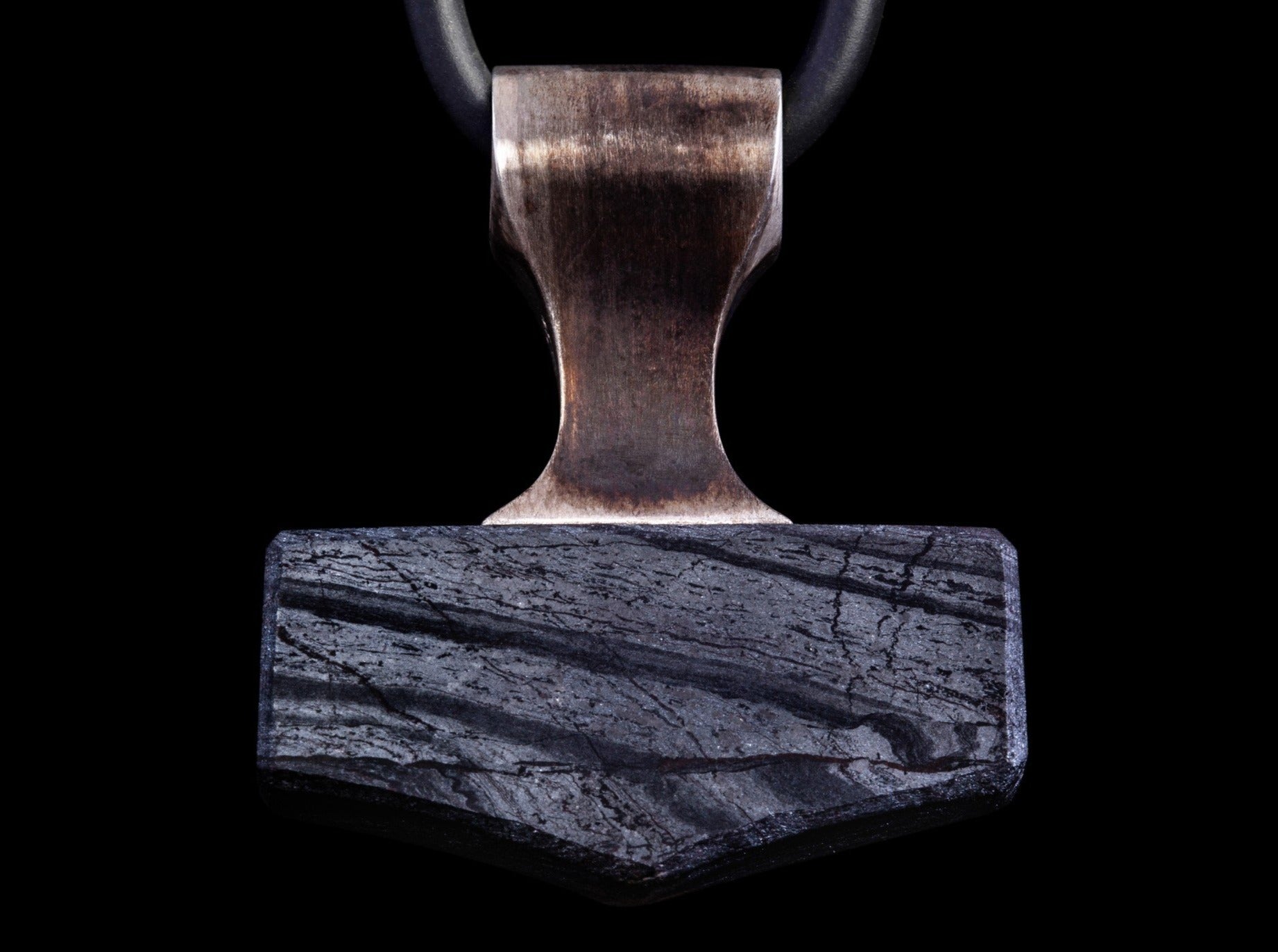 silver and grey stone hammer pendant