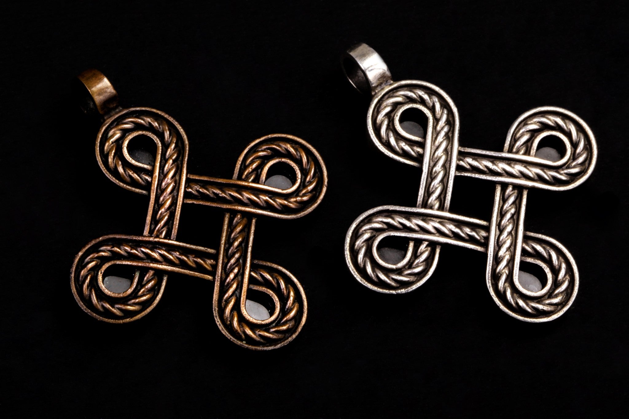 bronze and silver crosses with black Onyx