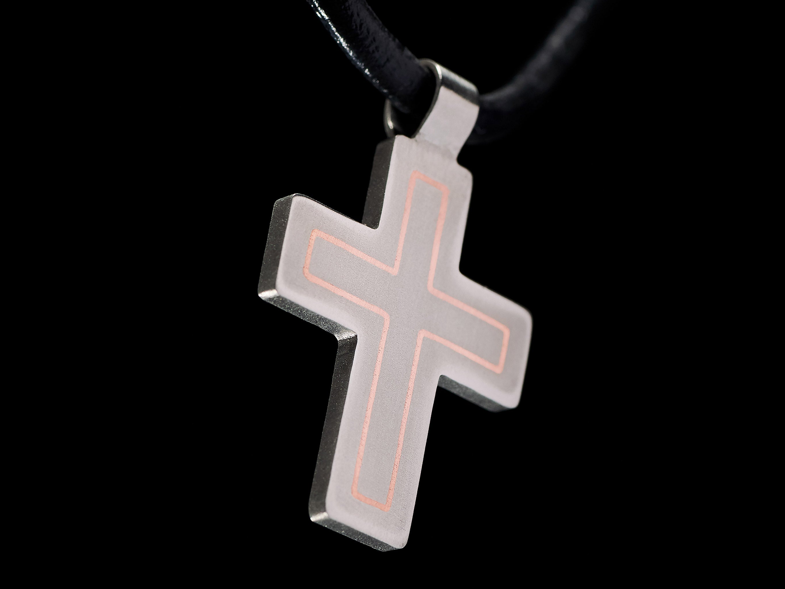 Modern titanium cross pendant with brass inlay. Minimalist cross necklace