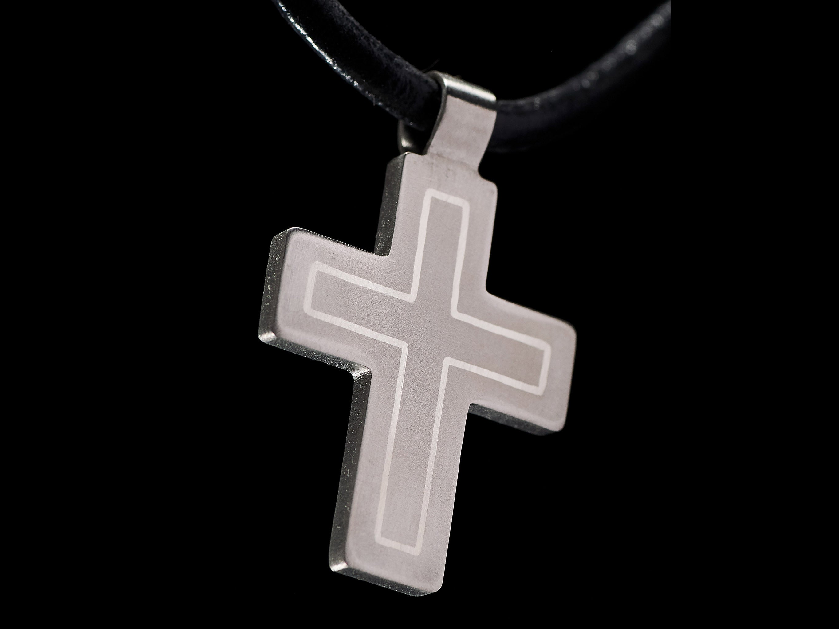 Modern titanium cross pendant with brass inlay. Minimalist cross necklace