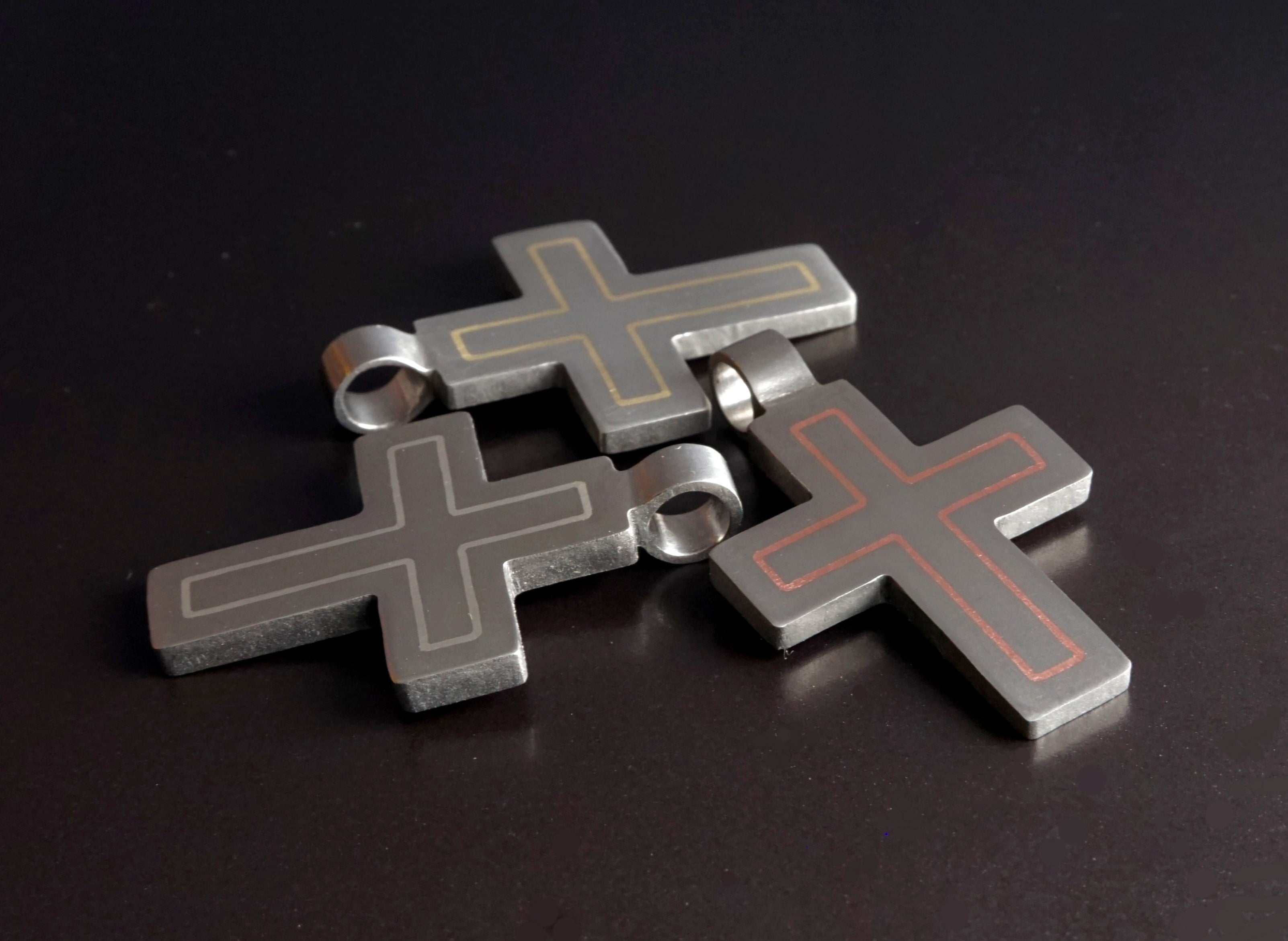 Modern titanium cross pendant with custom metal inlay options. Minimalist cross necklace
