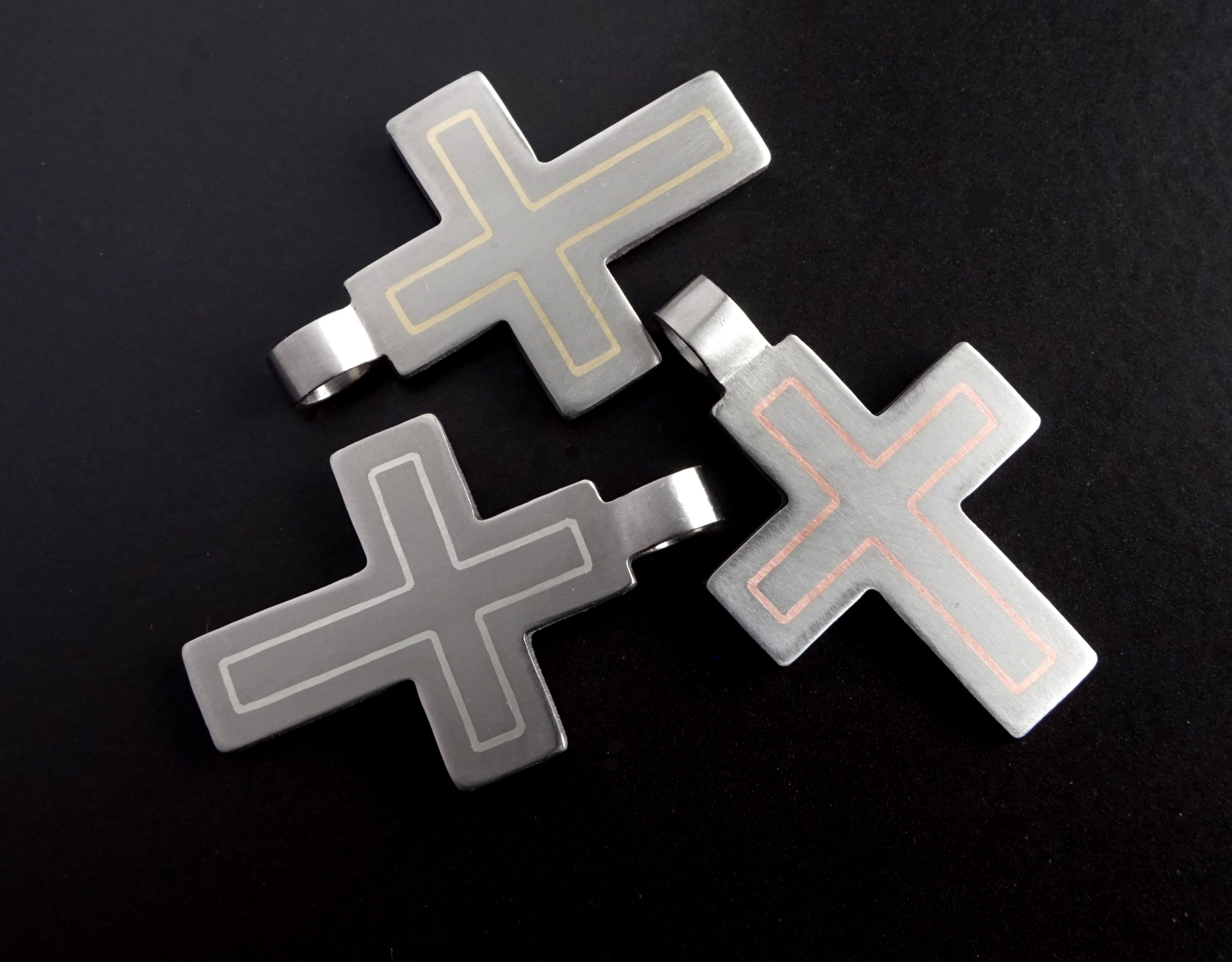 Modern titanium cross pendant with custom metal inlay options. Minimalist cross necklace