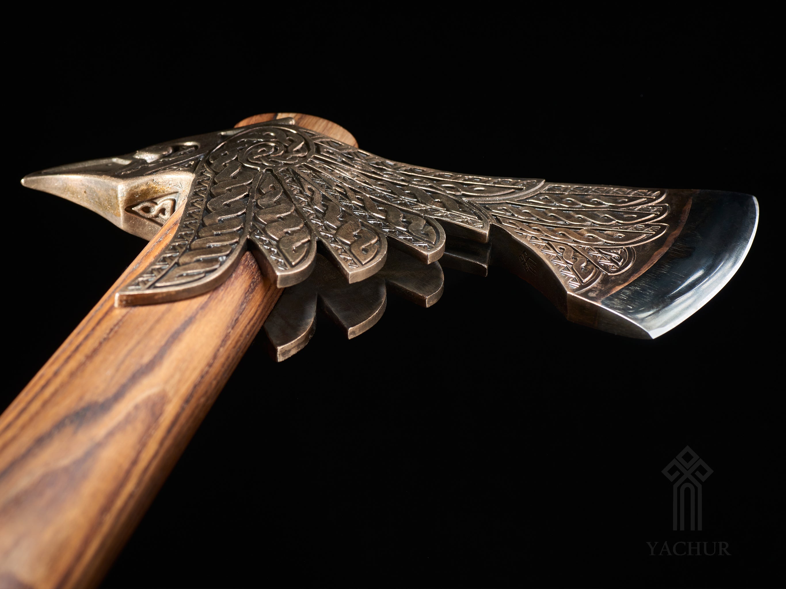 Texture detail of handcrafted bronze and steel Viking-inspired artisan axe