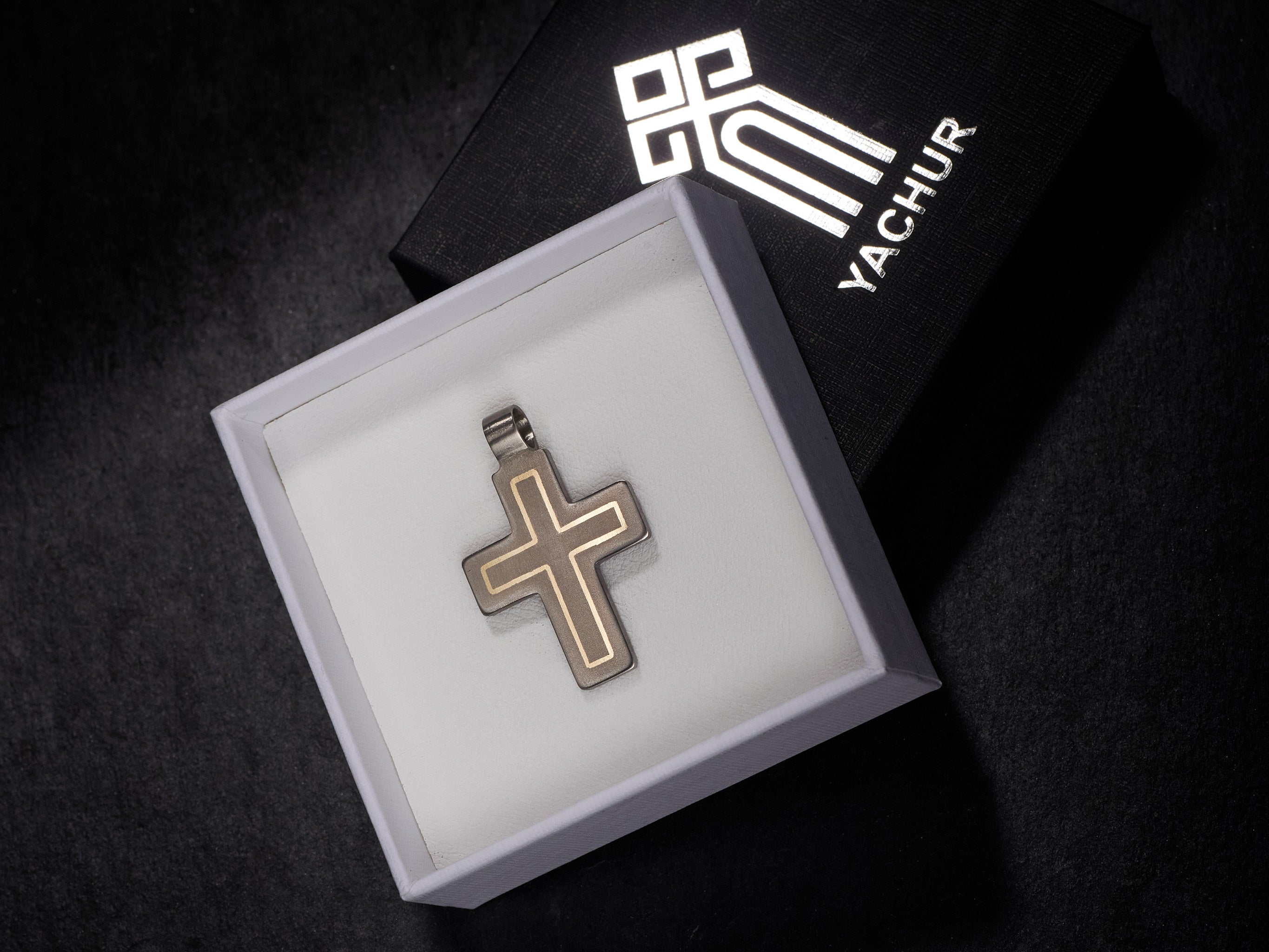 Modern titanium cross pendant with brass inlay. Minimalist cross necklace