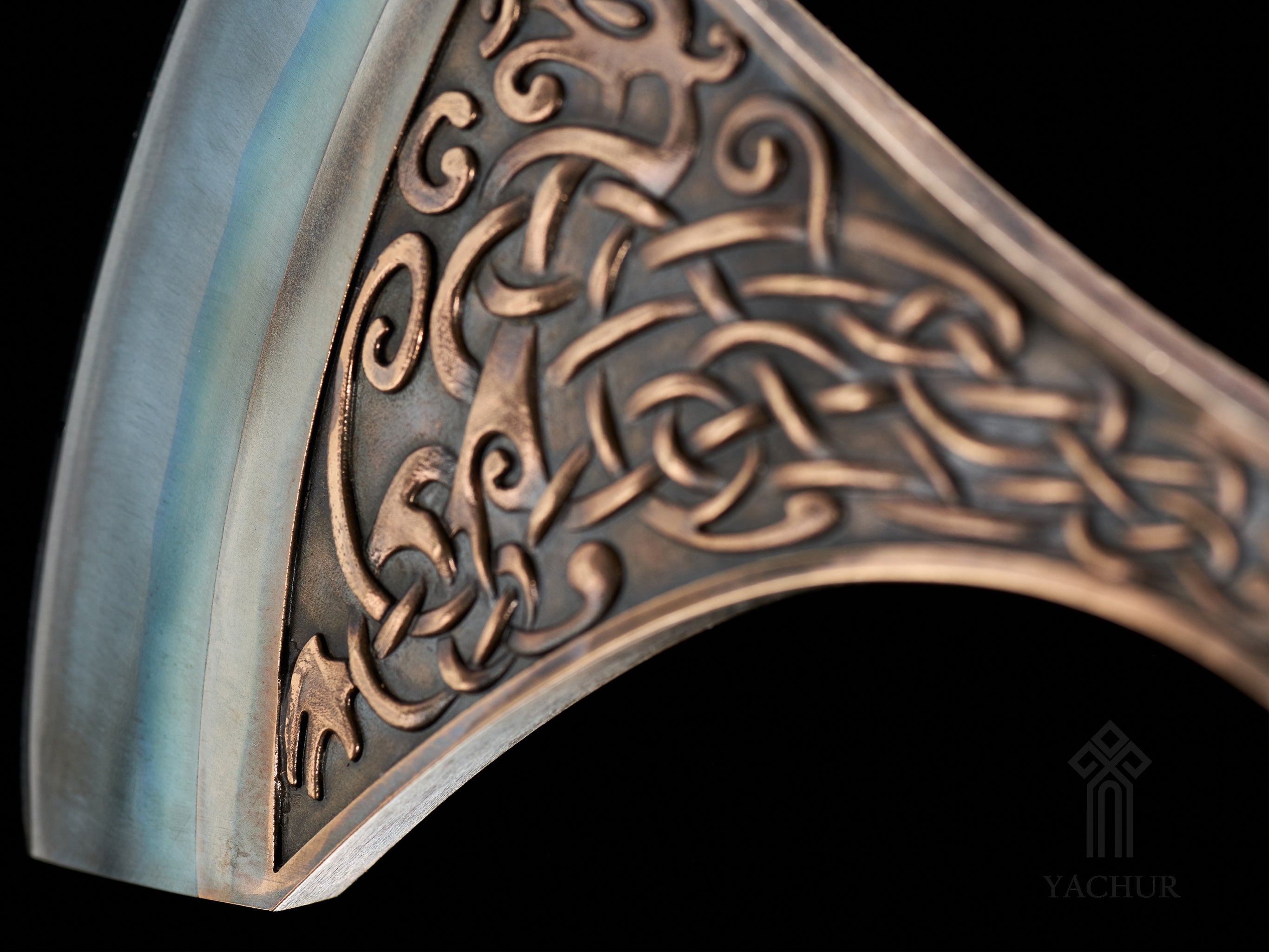 Close-up of bimetallic axe head made from tool steel and beryllium bronze