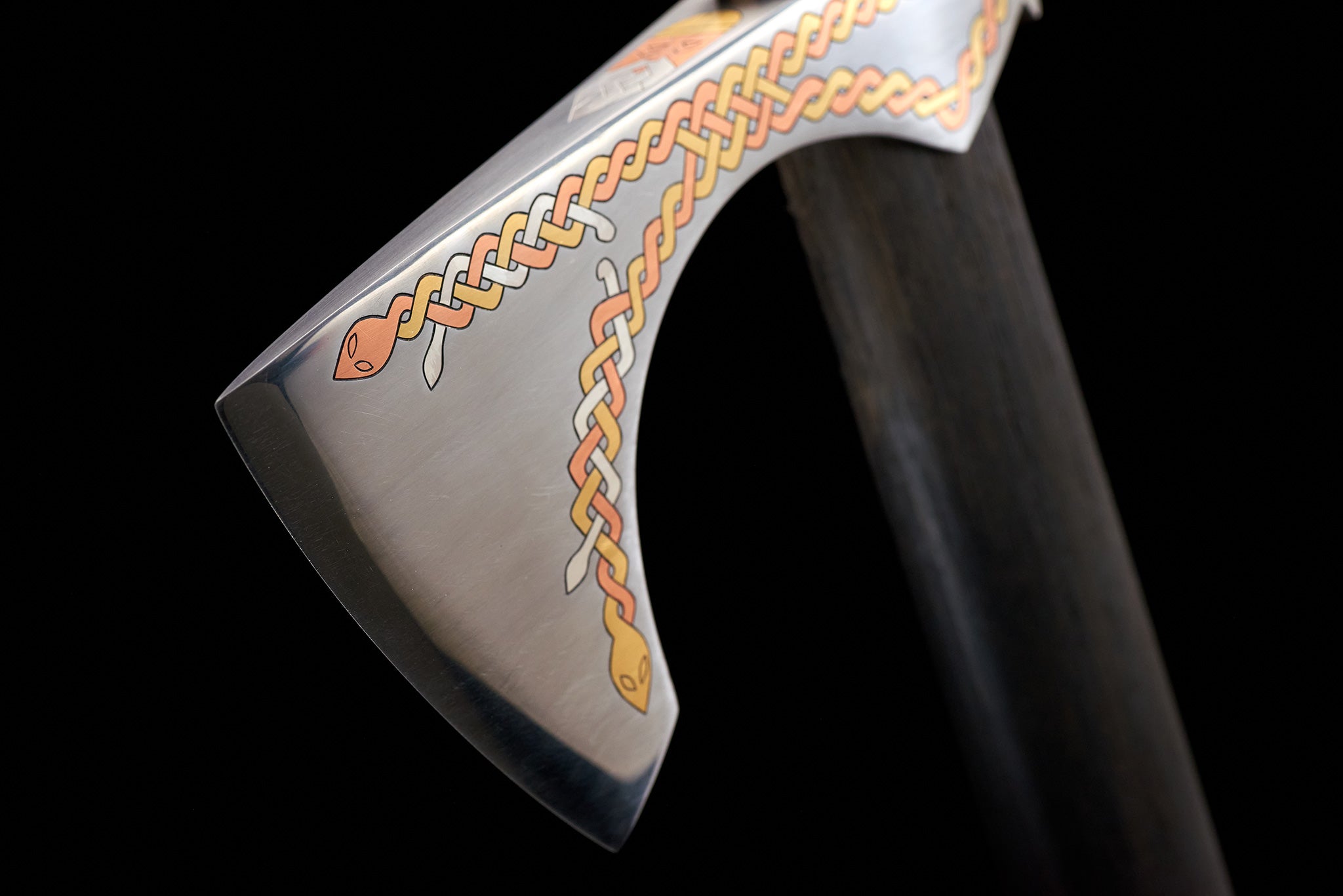 Close-up of copper, silver, and brass inlay craftsmanship