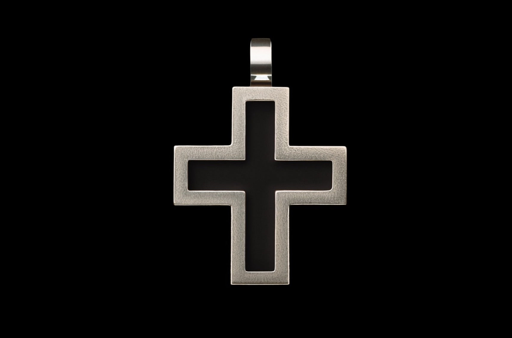 handmade silver cross with obsidian gemstone