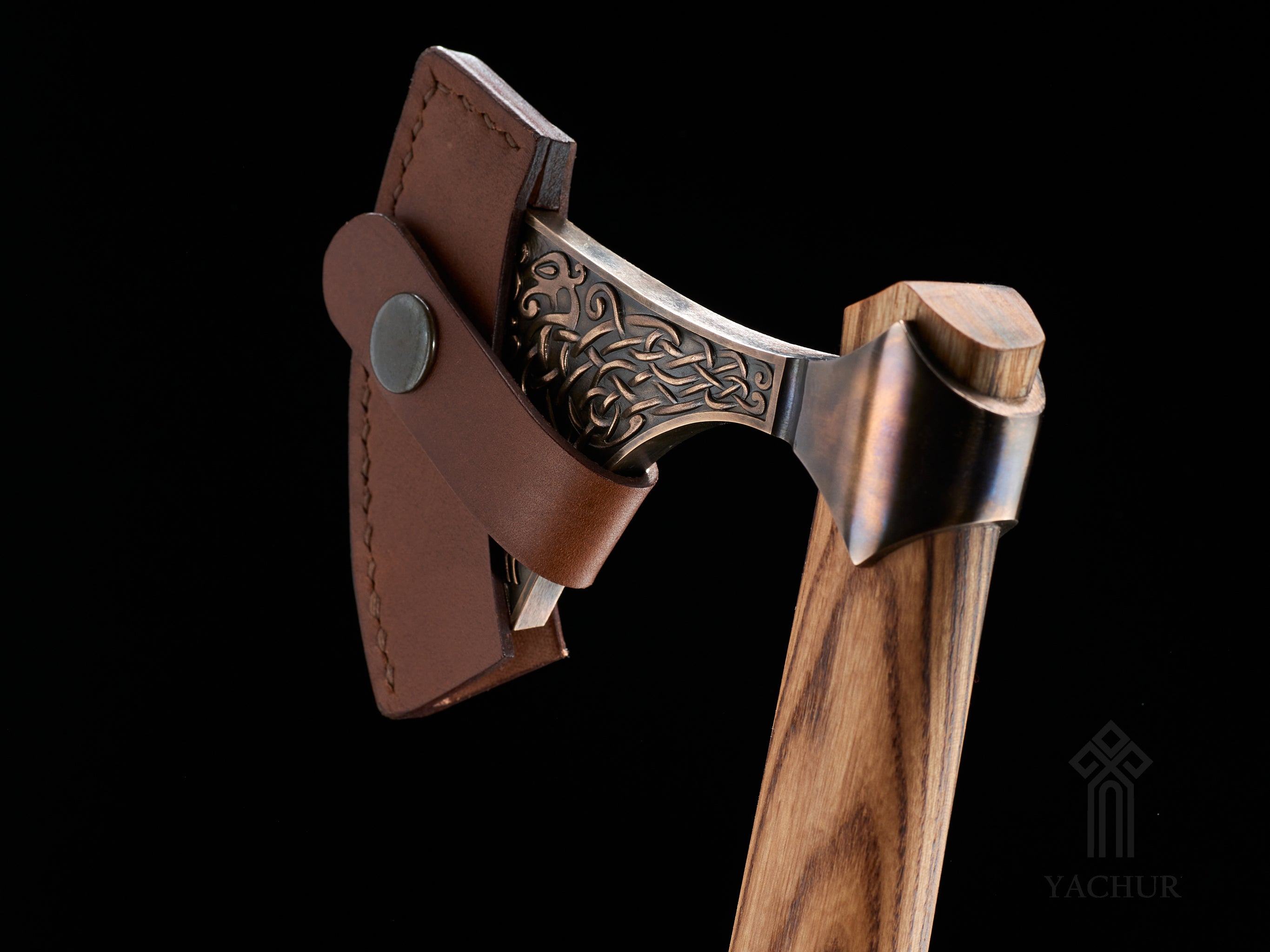 Overview of handcrafted Urnes style Viking axe with ash wood handle