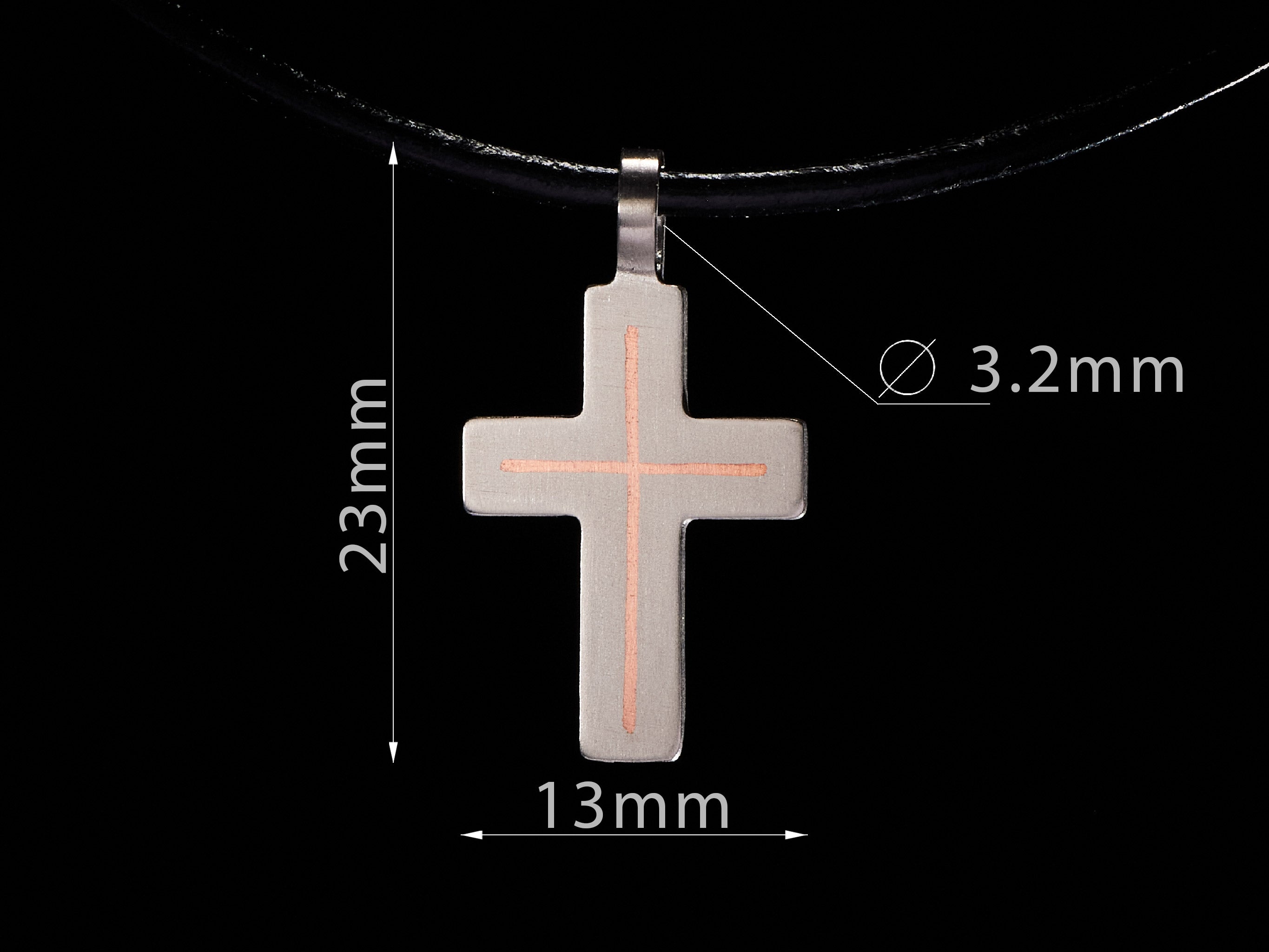 Dimensions of small titanium cross pendant with size details for accurate understanding