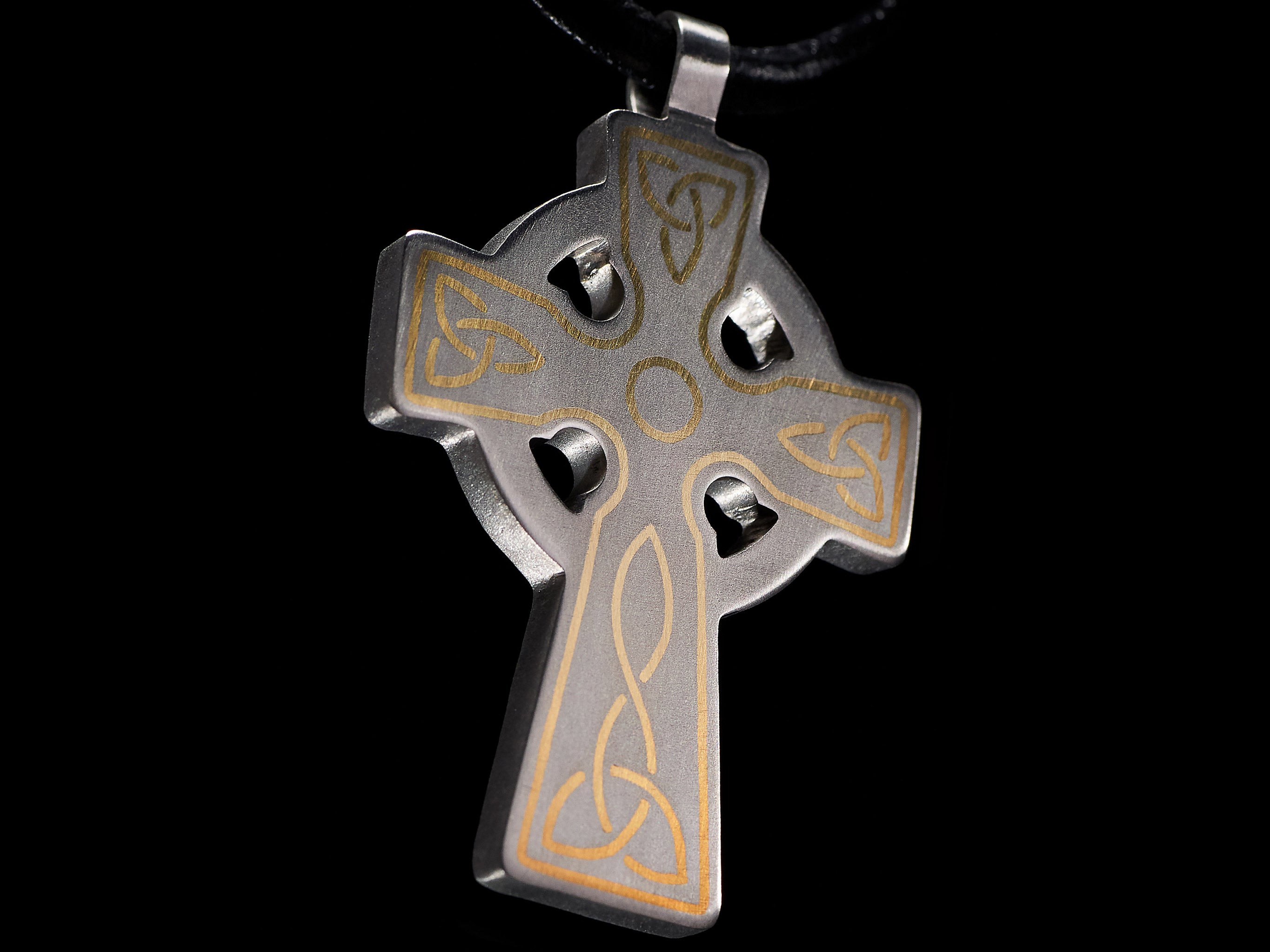 handmade titanium celtic cross pendant with brass inlay