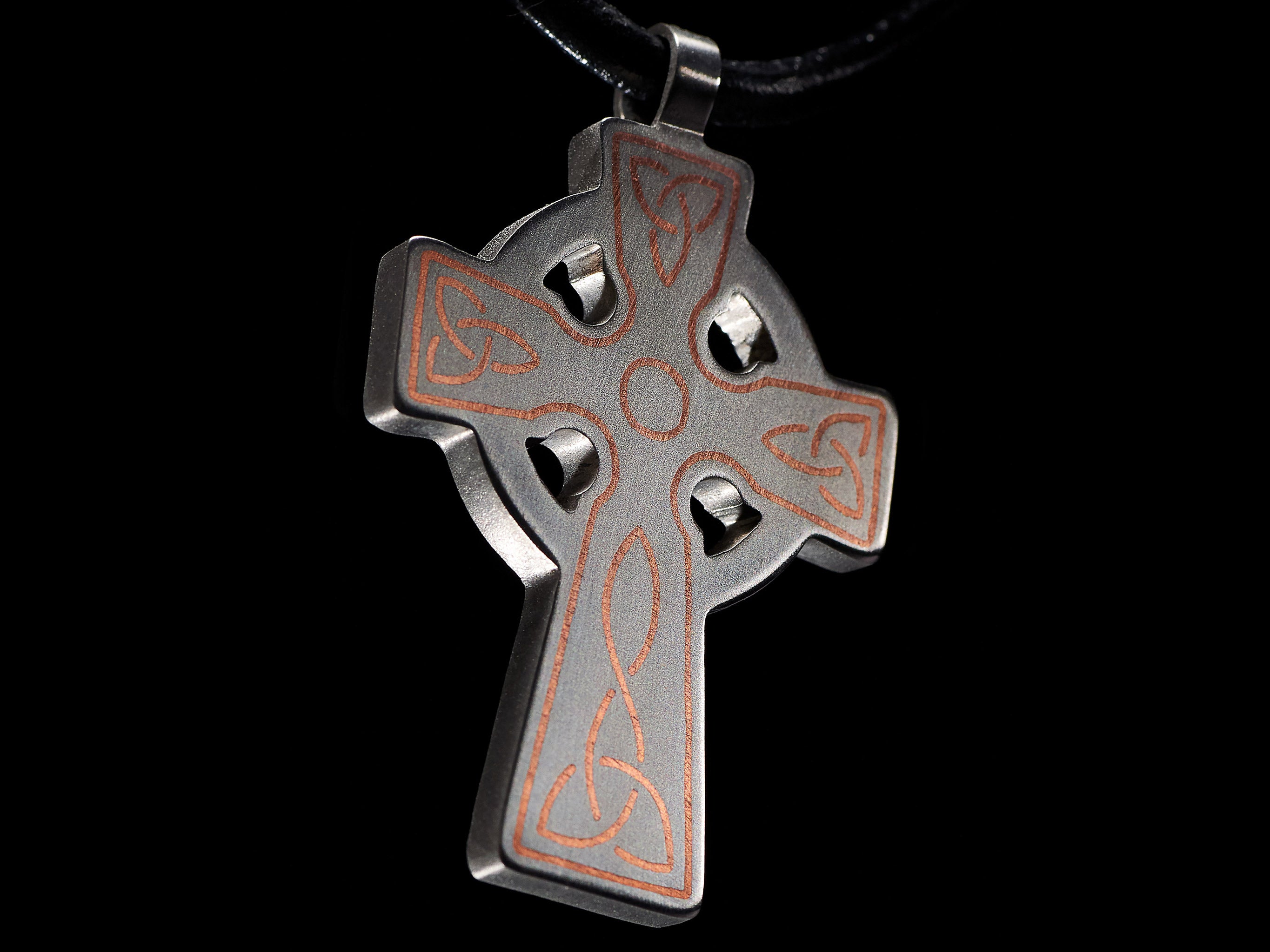 handmade titanium celtic cross pendant with copper inlay