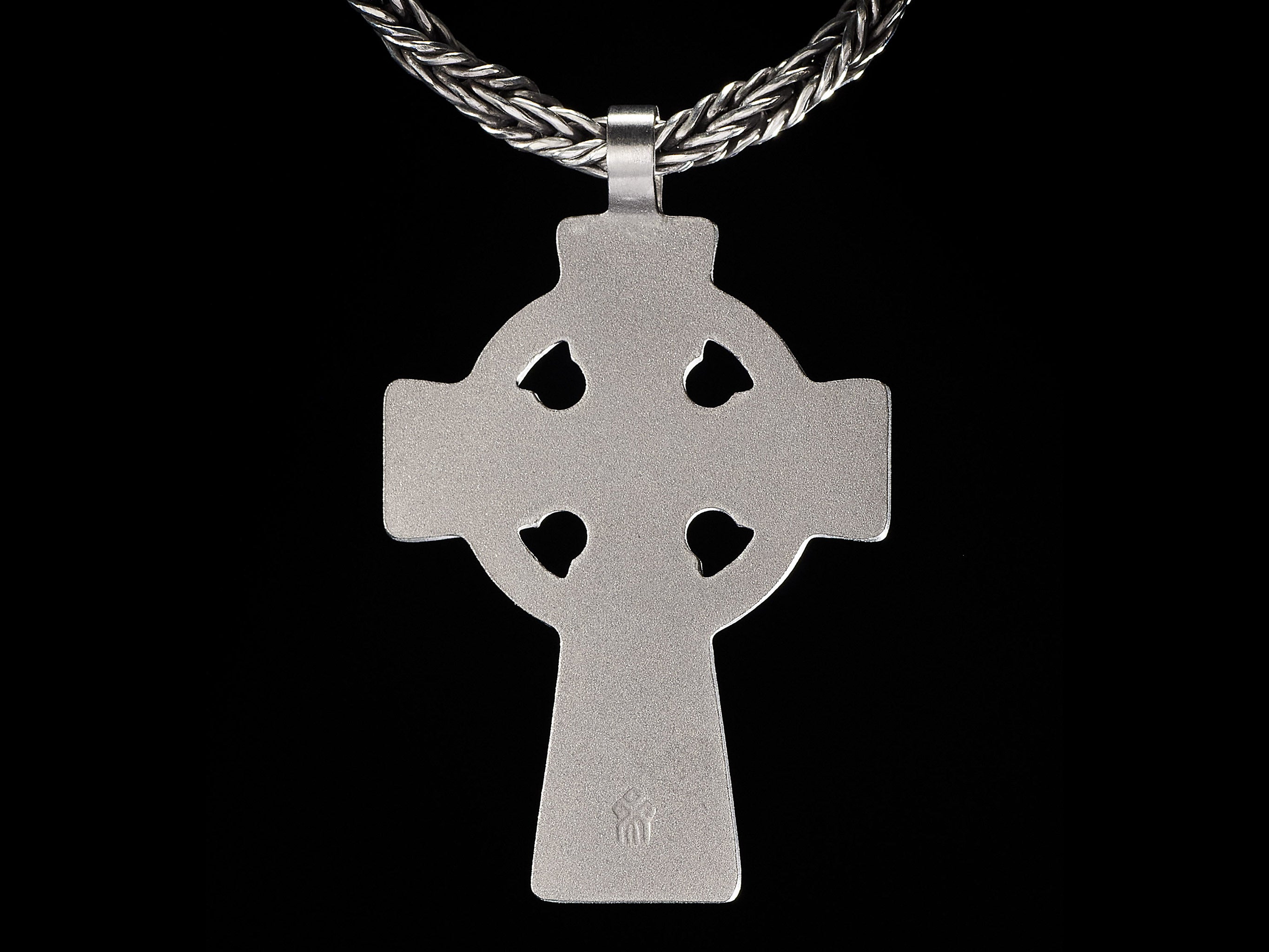 back side of handmade titanium celtic cross pendant