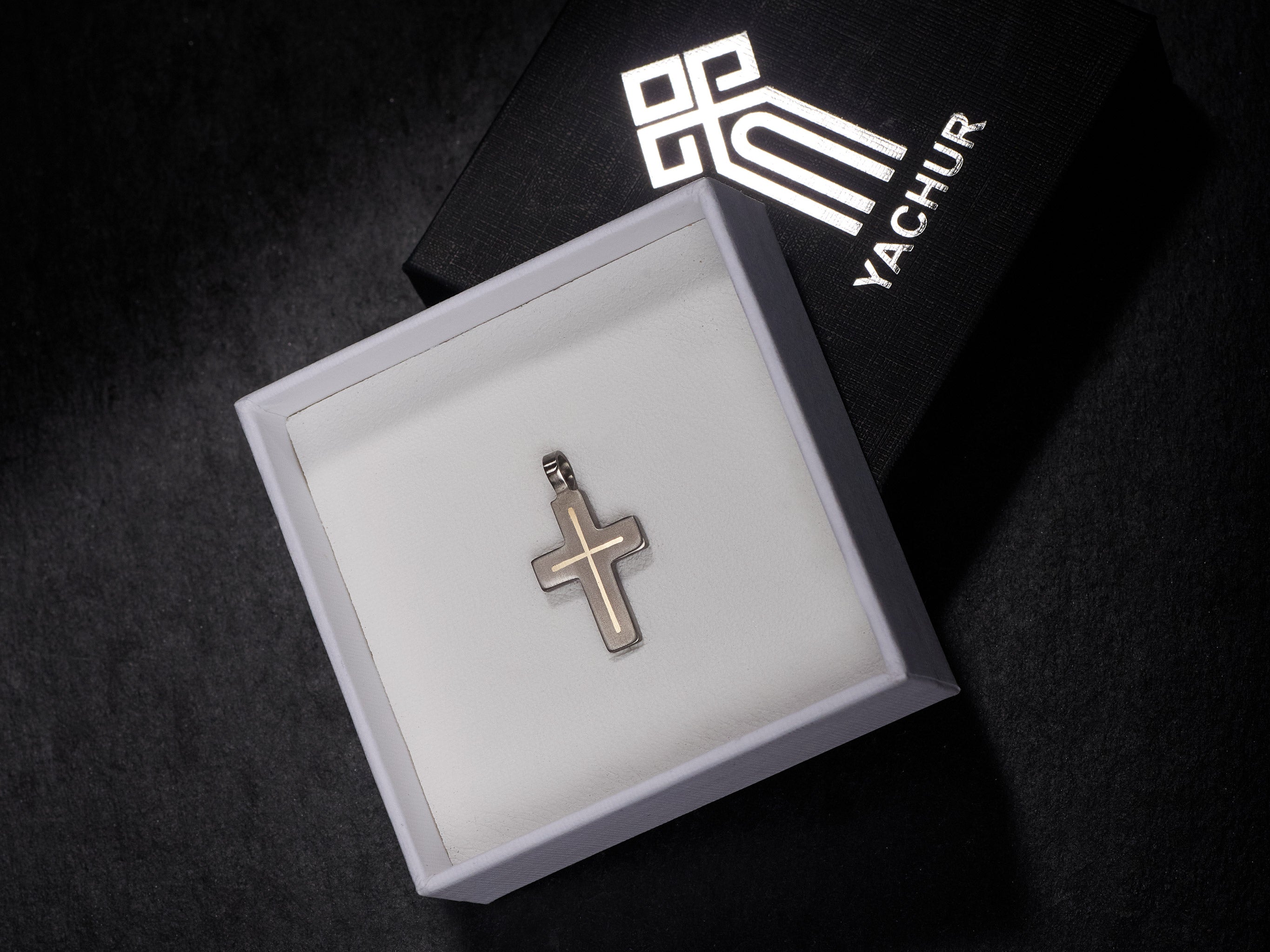 Handmade titanium cross pendant in gift box with brass inlay options ready for gift