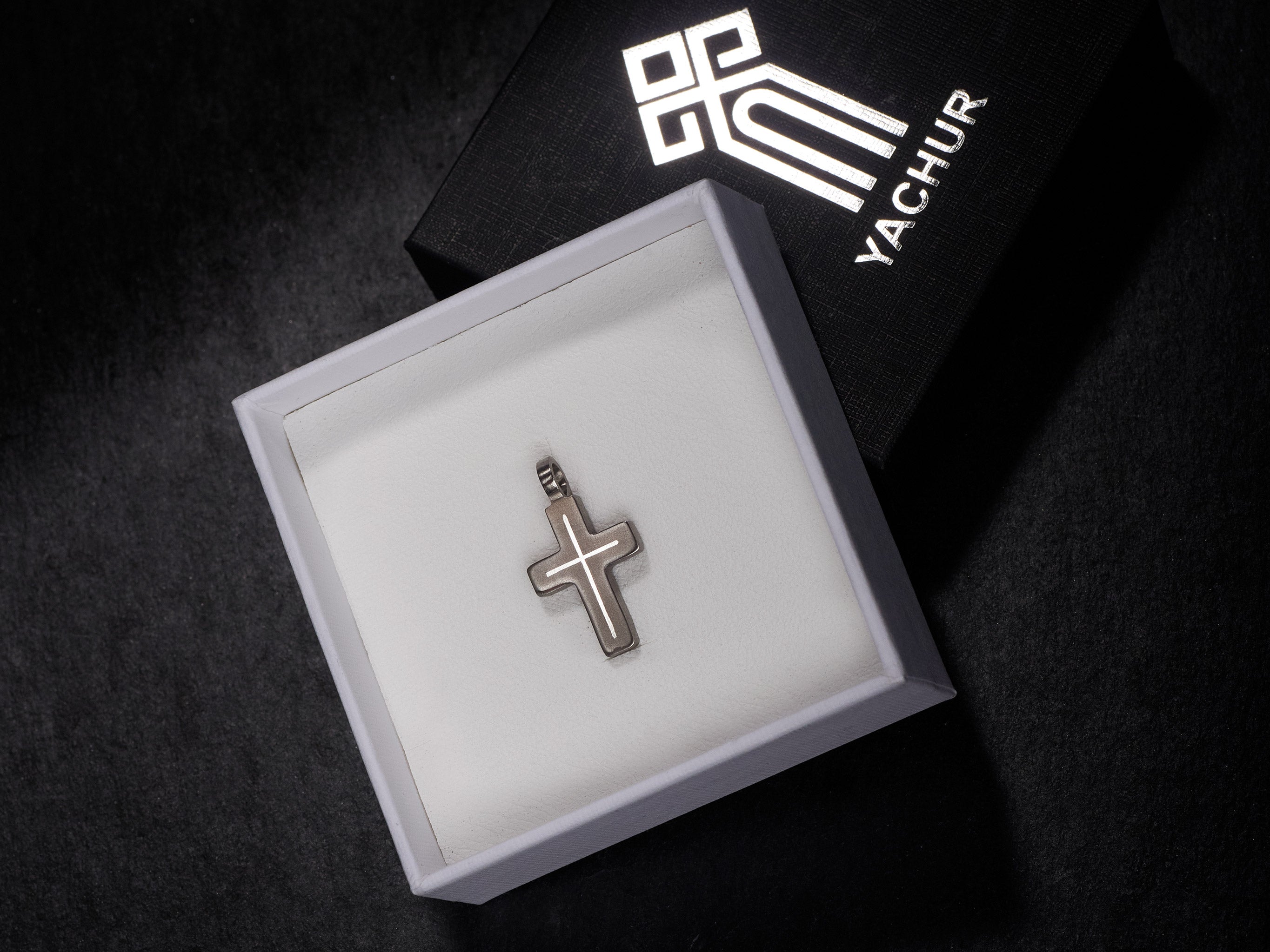 Handmade titanium cross pendant in gift box with silver inlay options ready for gift