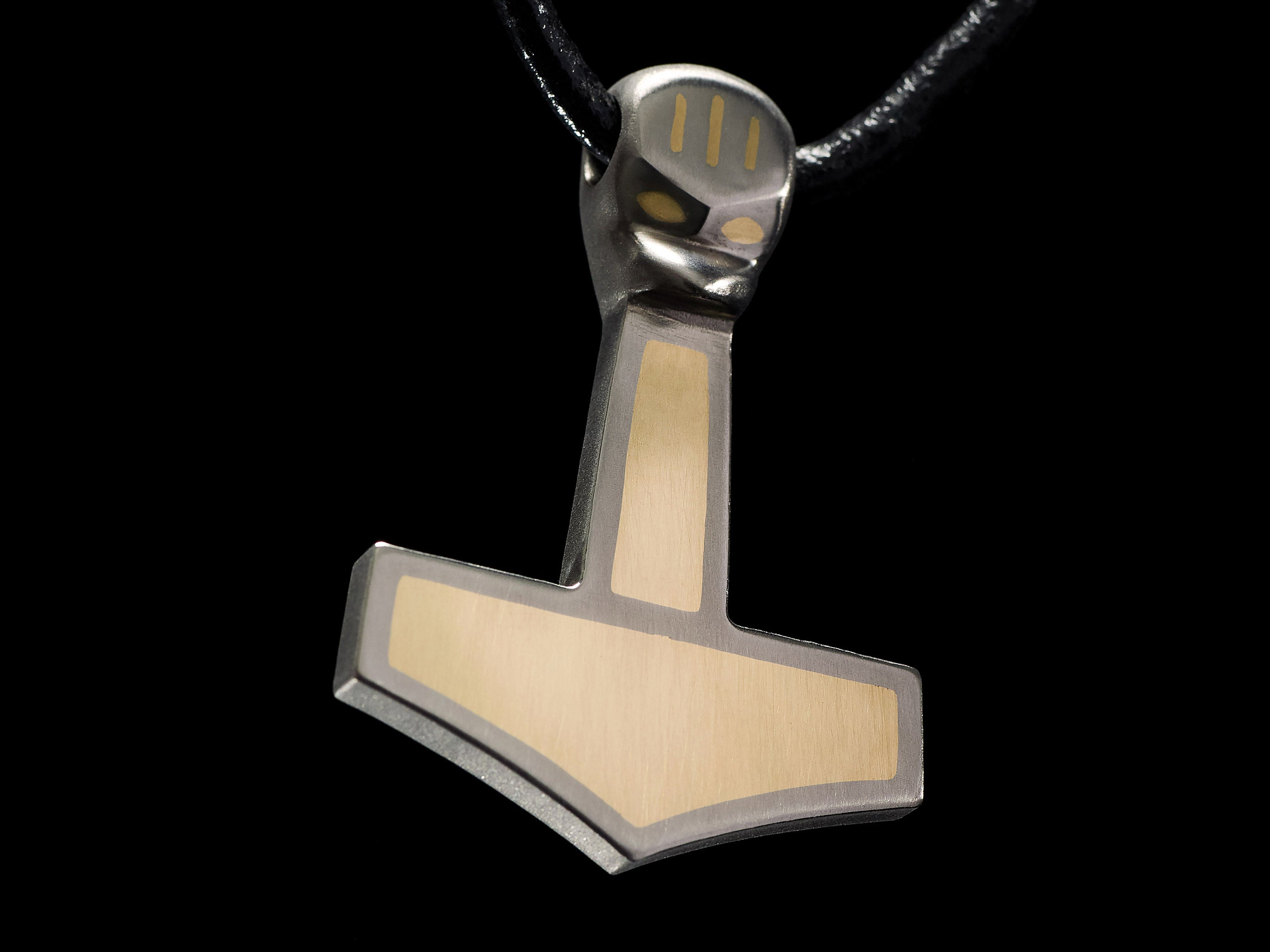 Handmade titanium Thor’s Hammer pendant with brass inlay inspired by Viking Mjolnir