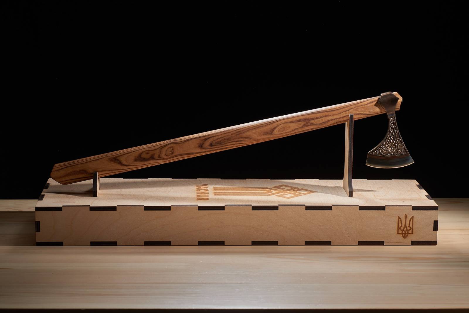 Ash wood handle treated with natural linseed oil on Urnes style axe