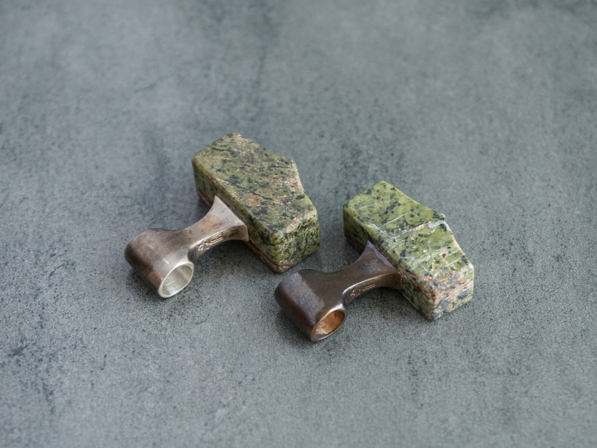 bronze and silver hammer pendants
