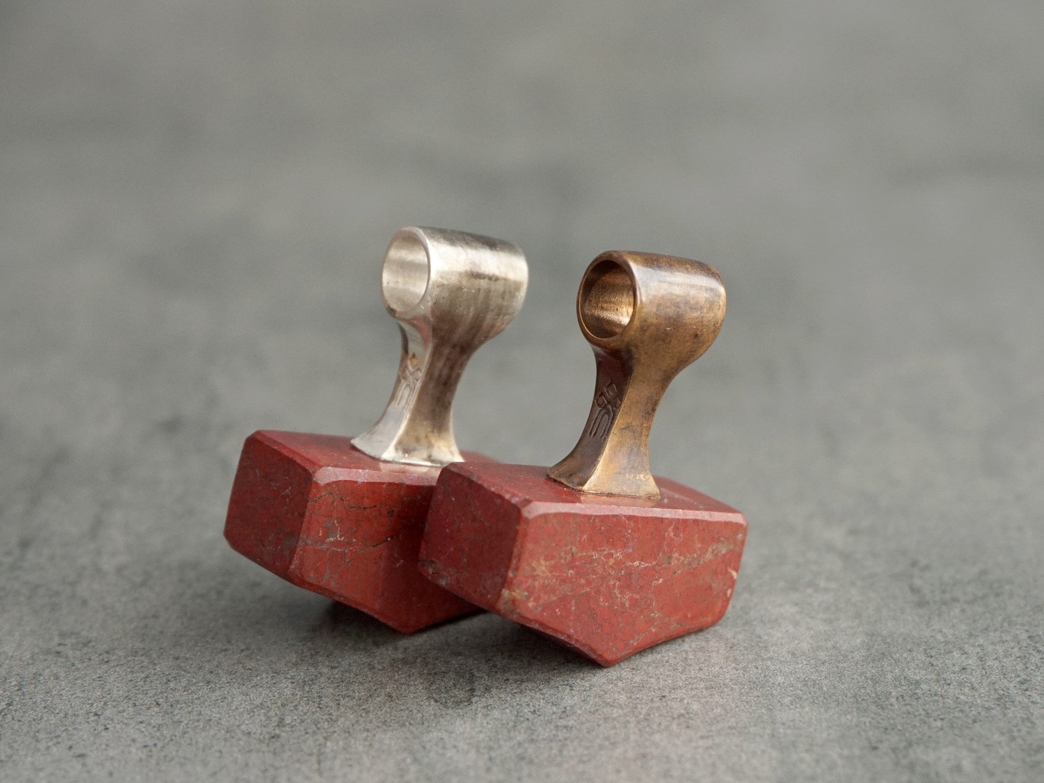 bronze and silver mjolnir pendants