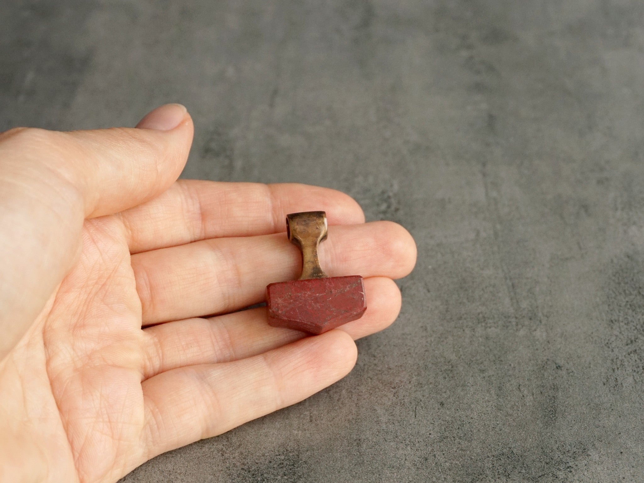 small bronze and red Jasper hammer