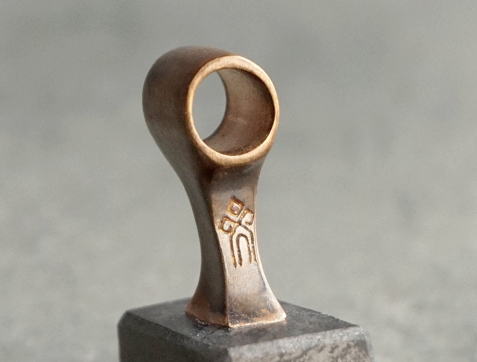 shop's logo 'Yachur' on the pendant