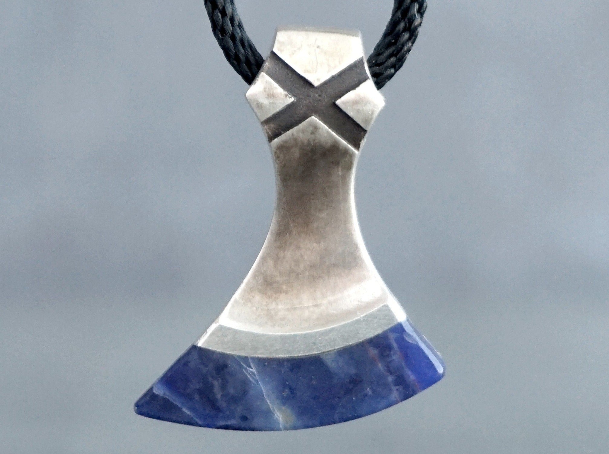silver and blue sodalite stone axe amulet 