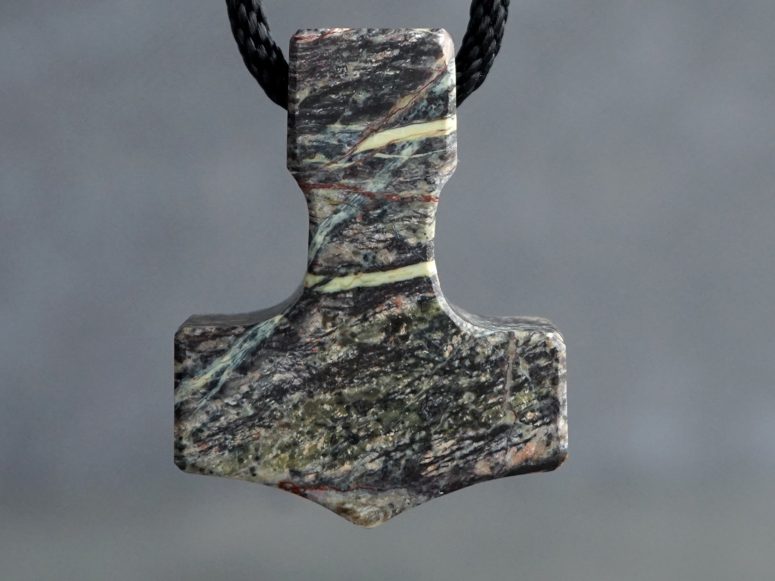 Thor's hammer carved out of multicolored Serpentine stone