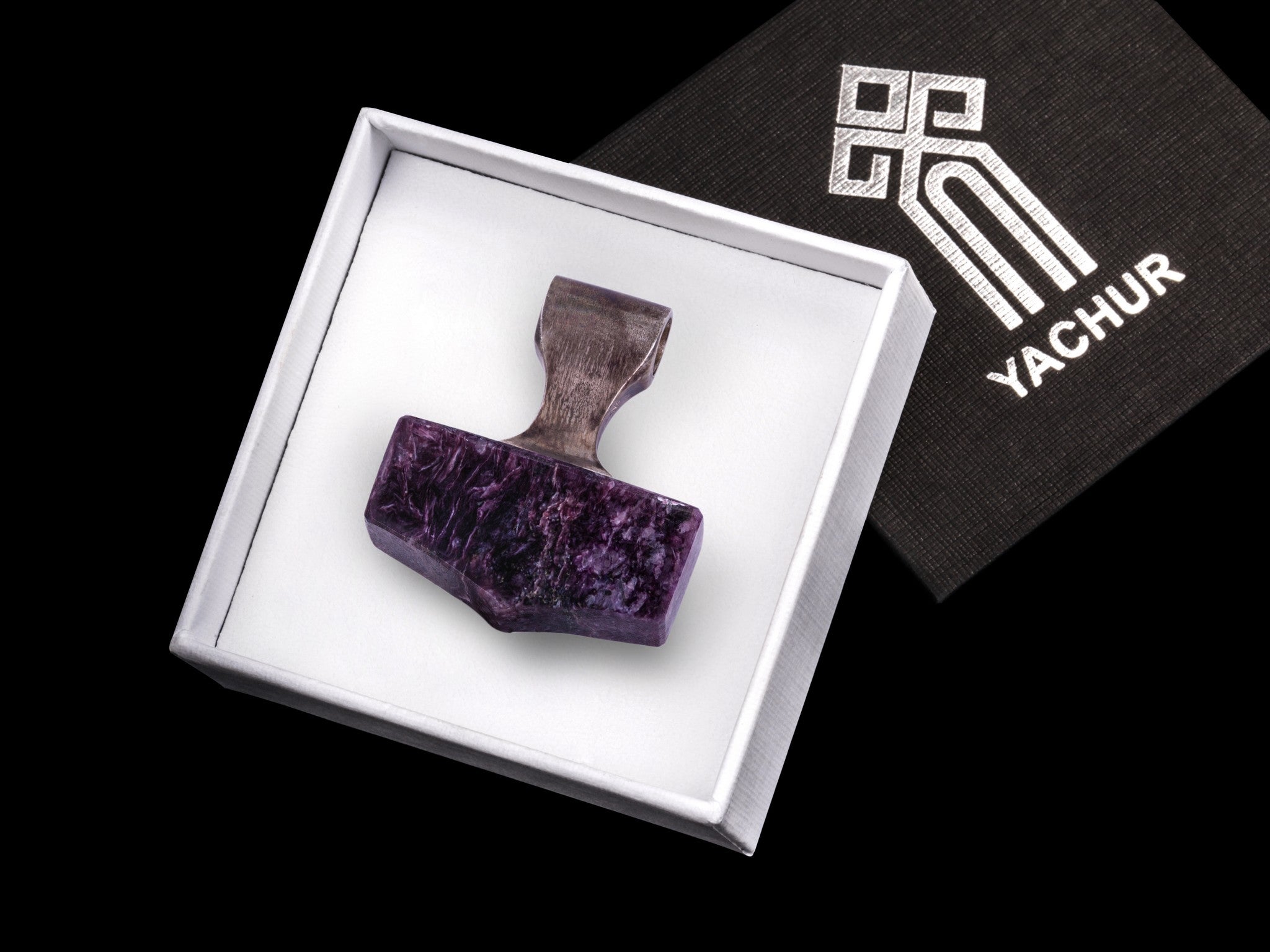 silver and charoite stone hammer pendant in a branded gift box