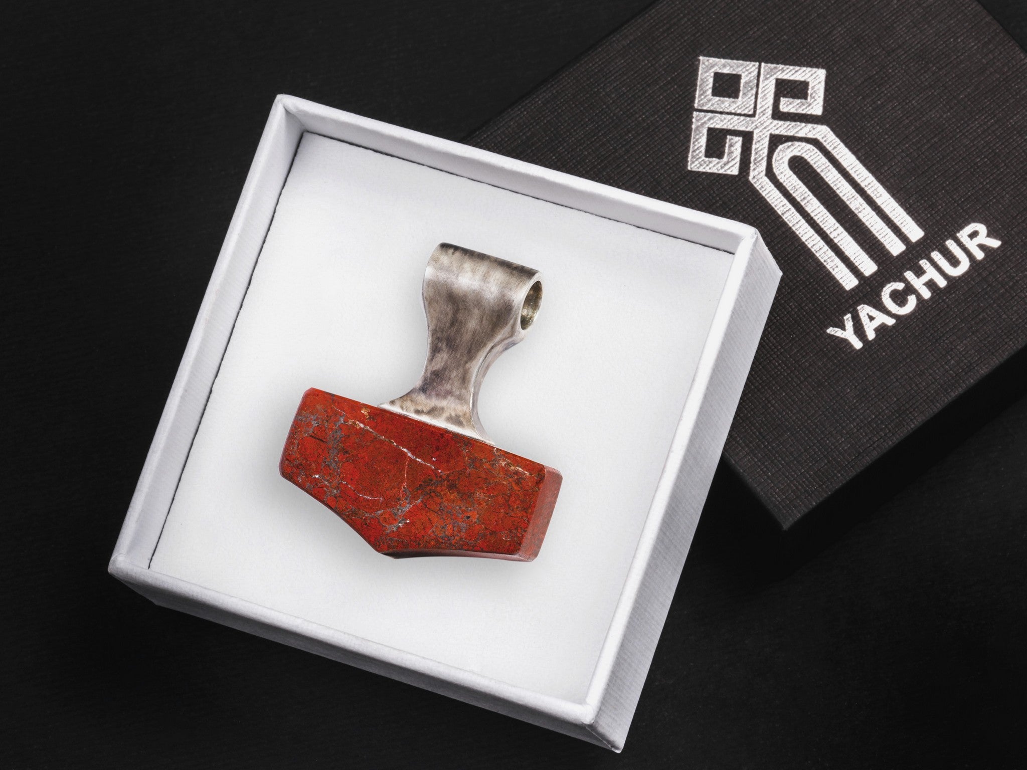 silver and red Jasper hammer in a branded gift box