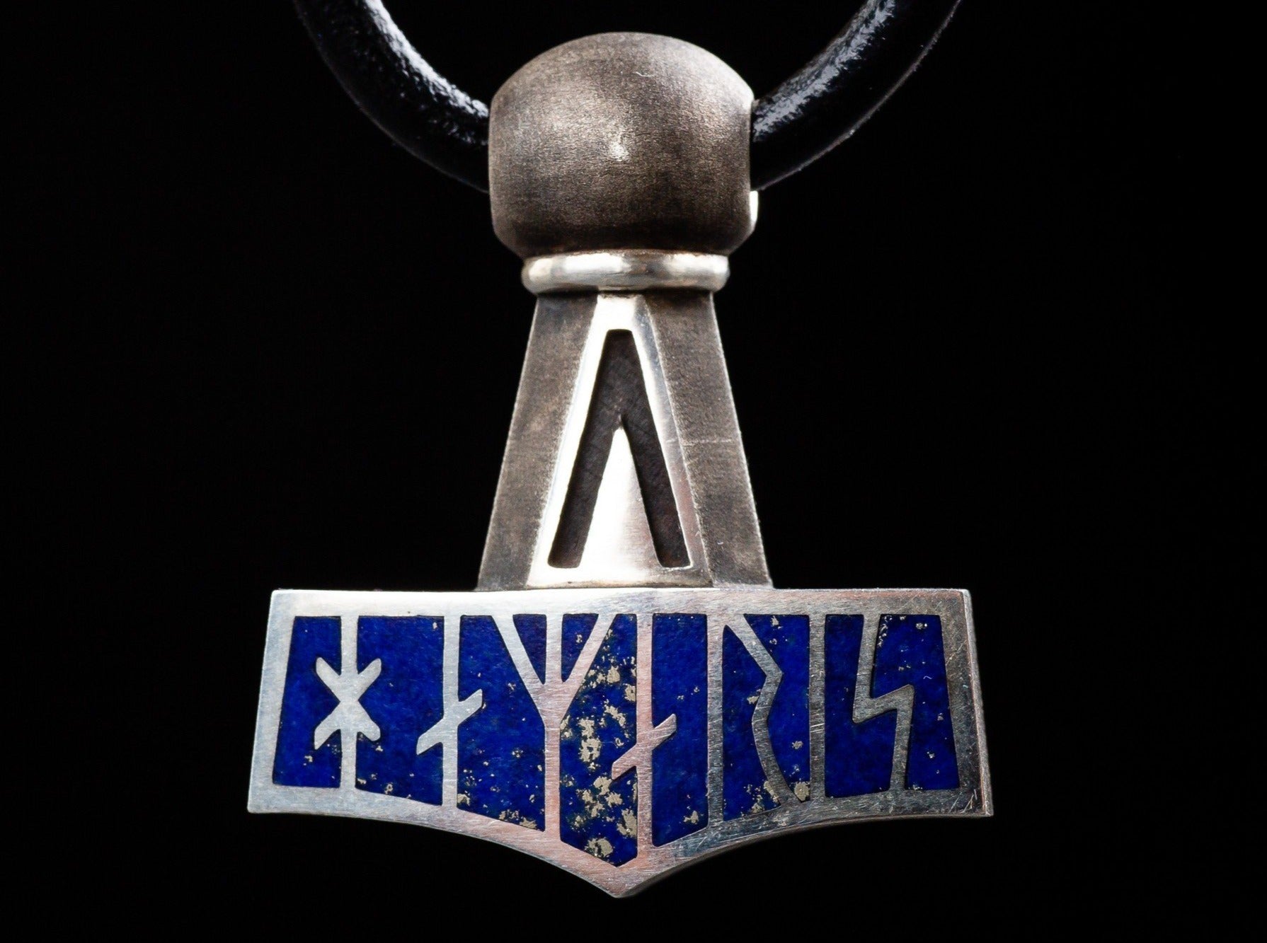 silver Thor's hammer amulet with blue runes