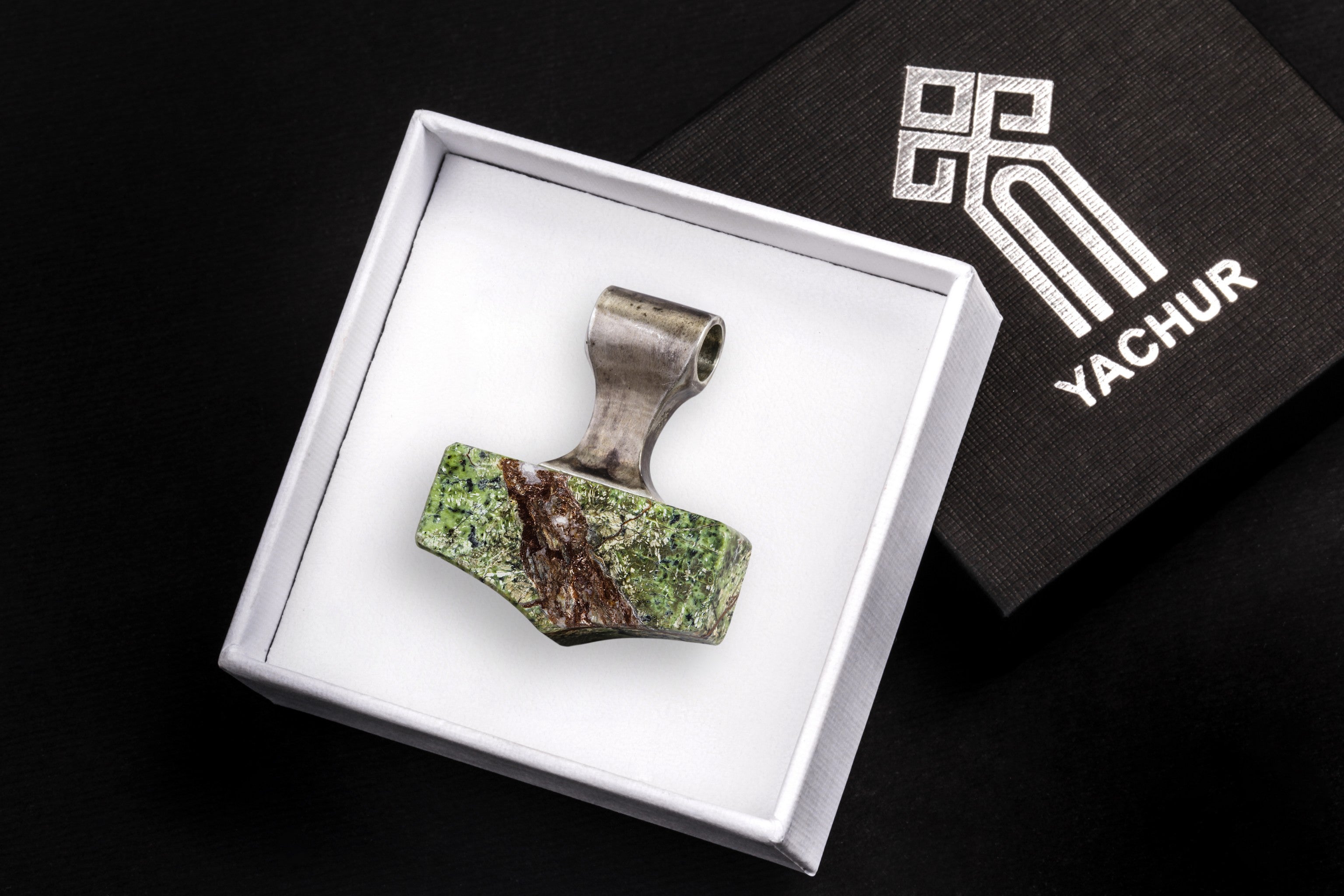 silver hammer in a branded gift box