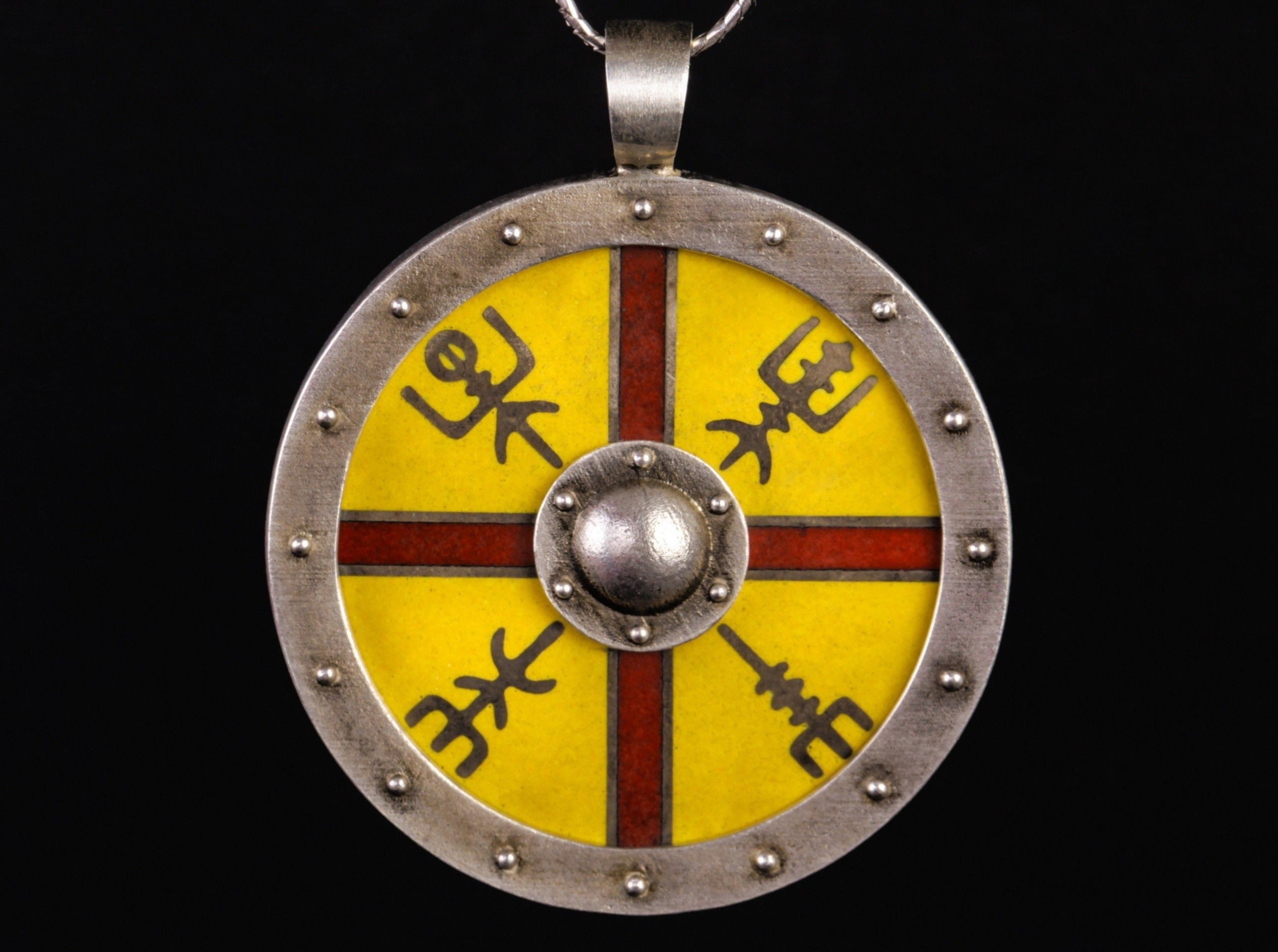 silver shield with cross and runes   