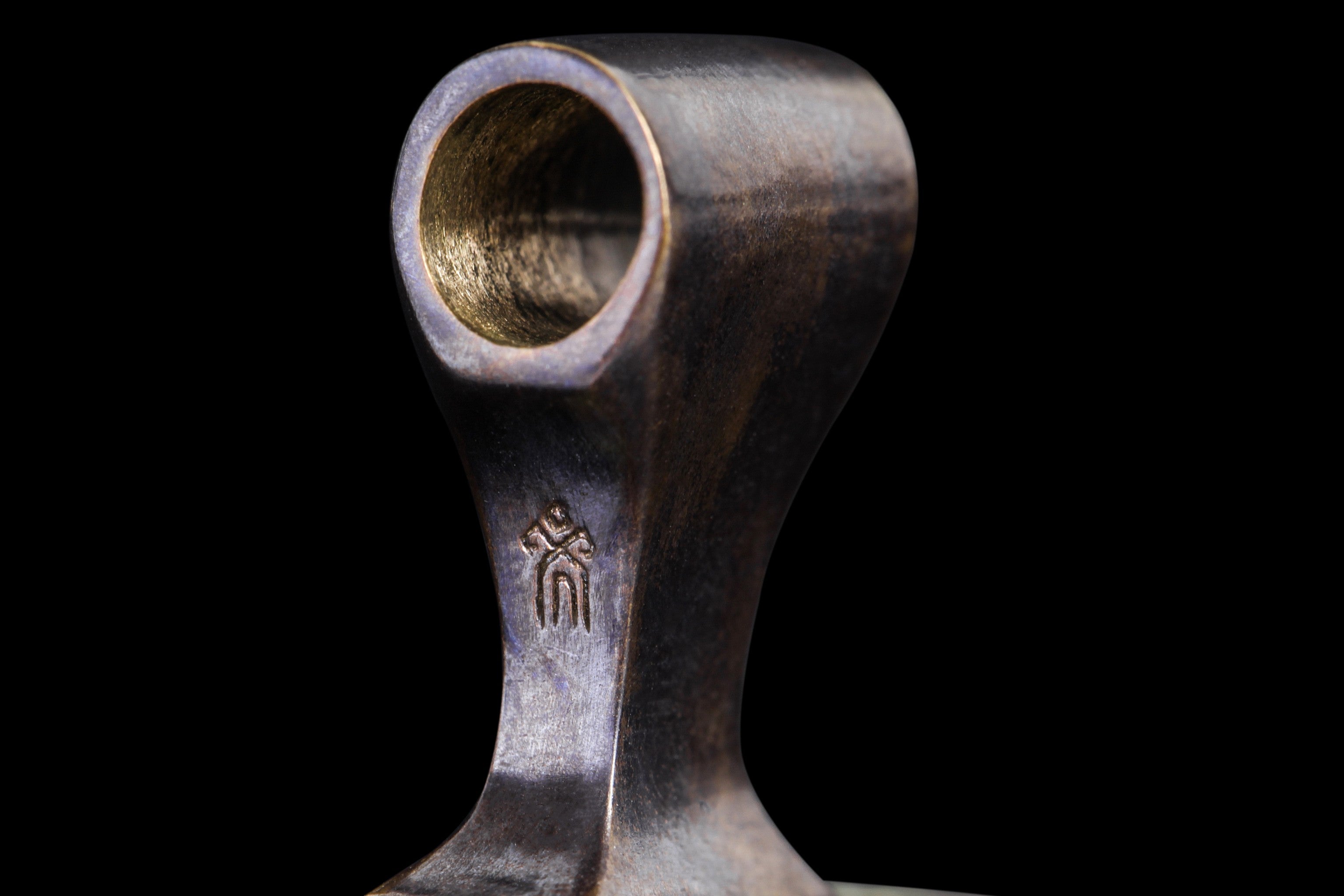 'Yachur' logo on a bronze hammer pendant